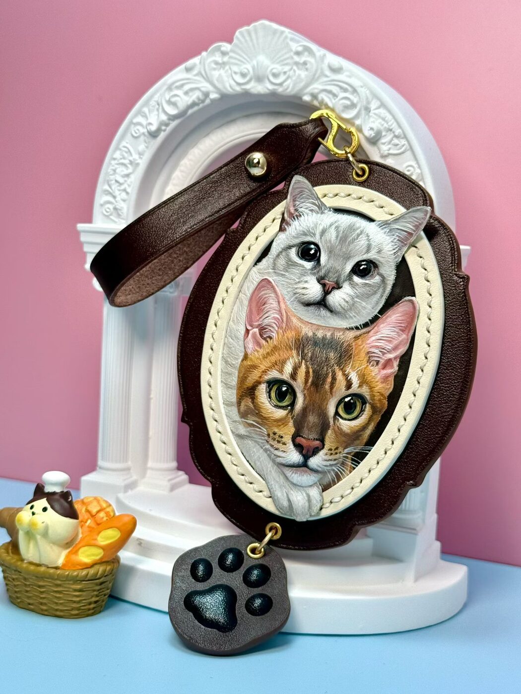 Hand-carved leather pet portrait featuring two cats
