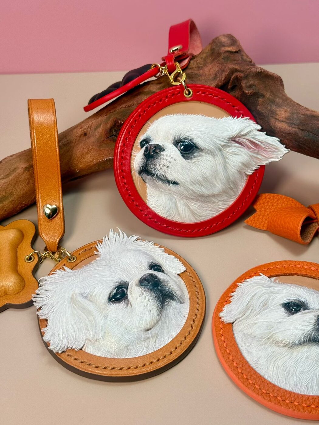 A collection of custom leather portraits of white dogs